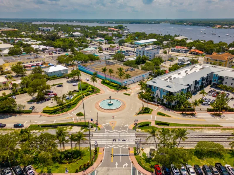 Aerial view of a roundabout and surrounding streets.
