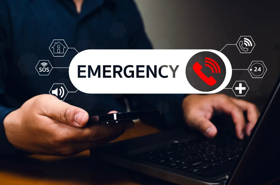 Emergency contact graphic with a red telephone symbol.